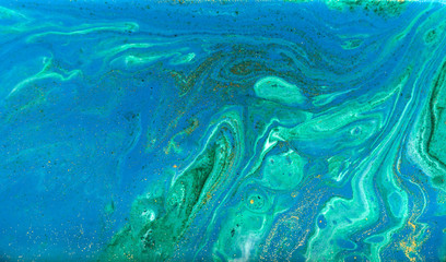Fototapeta na wymiar Blue, green and gold marbling pattern. Golden powder marble liquid texture.