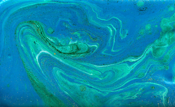 Blue, green and gold marbling pattern. Golden powder marble liquid texture. © anya babii