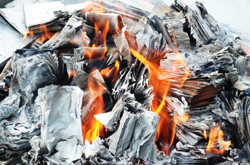 The fire is caused by burning paper. Destruction of confidential documents or not