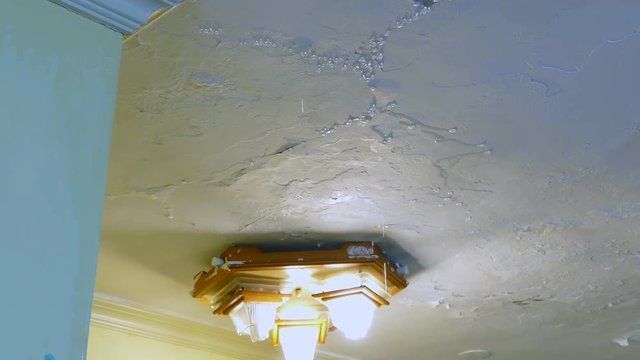 Leaking ceiling with water damage