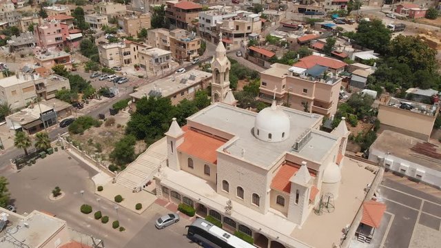 Main Maronite church in the city of Jish, Upper Galilee (Israel). View from the drone.