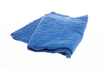 Blue cotton napkins, isolated on a white background