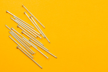 Nails on a yellow background