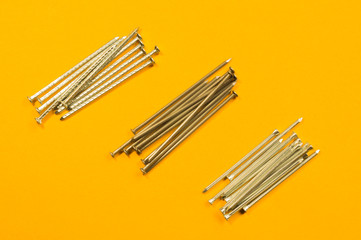 Nails on a yellow background