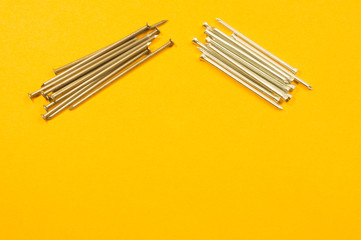 Nails on a yellow background
