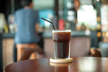 Black ice coffee on wood desk