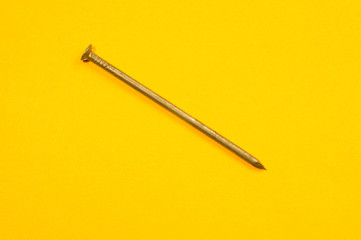 Nails on a yellow background