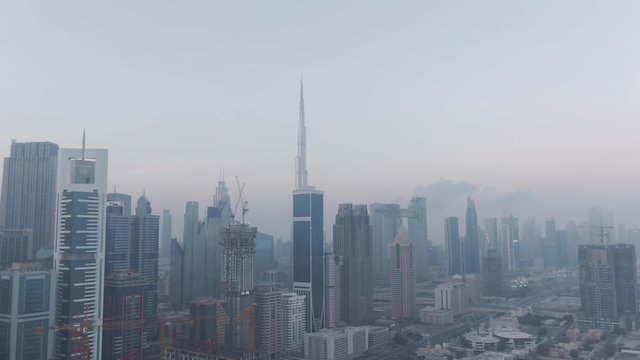 Cityscape and Skyline of Dubai, United Arab Emirates while sunrise