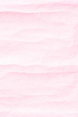 Old crumpled pink paper background texture