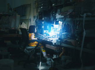 Girl stay at home with messy office desk and work from home