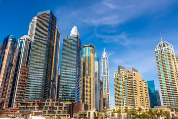 Obraz premium High-rise houses of modern futuristic design of Dubai Marina district.