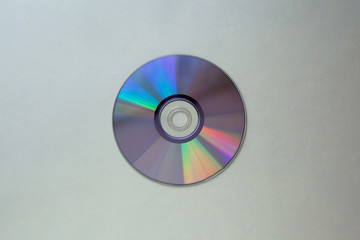 cd compact disc on  a gray  background top view with copy space 