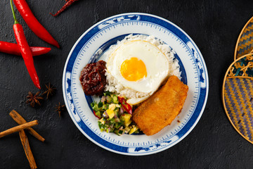 Asian food, fillet o fish on rice served