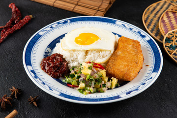 Asian food, fillet o fish on rice served