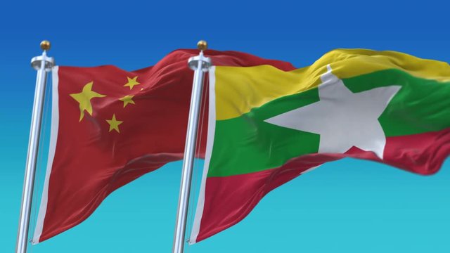 4k Seamless Myanmar and China Flags with blue sky background;A fully digital rendering;The animation loops at 20 seconds;MYA CN.
