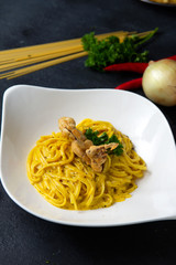 Spaghetti with olive oil with crab and topping with deep fried soft shell crab