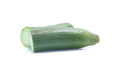 fresh green sponge gourd or luffa with slice isolated on white background