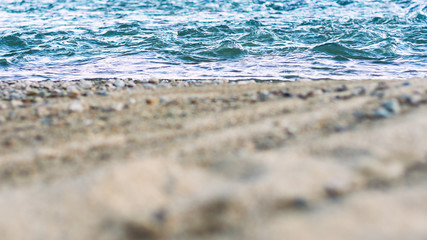 Low Angle View of Fast River Waves, Wet Coarse Sand, Pebble.