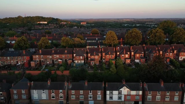 Ariel Drone Footage Of British Council Estate. Nottingham Built Up Area.  Golden Hour. People's Homes And Houses , UK British Community. Late Evening.