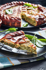 sliced Spinach Ricotta quiche on a plate