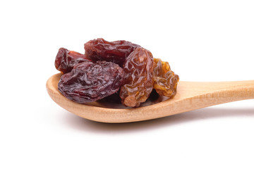 Dried raisins on white background.