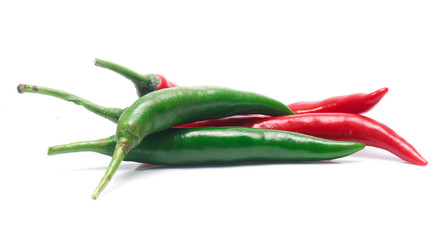 red and green chili pepper on white background