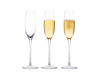 Elegant glasses of yellow champagne with bubbles