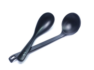 plastic black spoon, isolated on white background