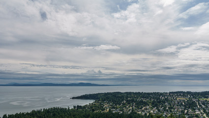 Aerial panoramic view of the city of Victoria from mount Douglas park with a beautiful Pacific Ocean scene.