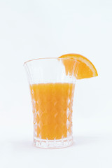 Orange juice on a white background - Mature and sweet orange