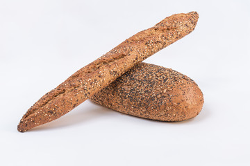 homemade bread, a baguette and an cereal bread, multigrain bread
