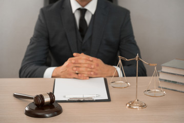 lawyer or judge work in the office with gavel and scale