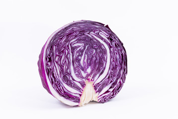 Obraz premium A fresh purple cabbage cut in half isolated on a white background