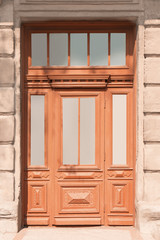 Big vintage wooden door of old building