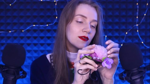 ASMR Video binaural sounds for relaxation mind, tingles, pleasure. Scratching from ear to ear. Round pink wax candle hard surface. New triggers for tingly feelings deep in mind. Beauty face, red lips