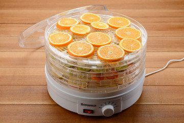 Orange slices in a dehydrator