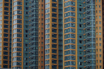 Dense Hong Kong highrise apartment building facade
