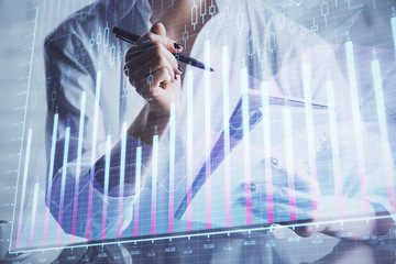 Financial chart drawn over hands taking notes background. Concept of research. Multi exposure