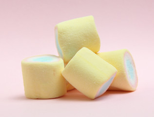 colorful marshmallows candy  on pink background