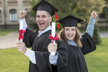 Young students celebrating their graduation