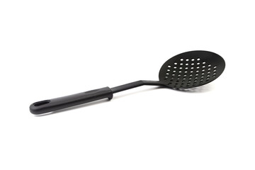 Black kitchen spatula utensils or kitchenware closeup isolated on white background