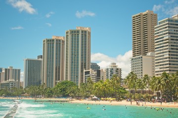 Fototapeta na wymiar View to the beach and skyscrapers in Waikiki Beach