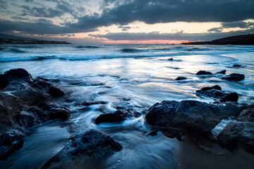 Wild sunset at the beach in winter season. Artistic landscape with sun and sea water. Beautiful concept of travel and adventure alternative vacation. Colors and background with water