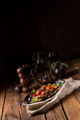 tender beef topped with various vegetables