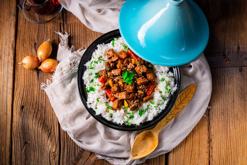 Tajin beef stew with rice paprika and sesame seeds