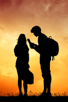 illustration of couple tourists at sunset