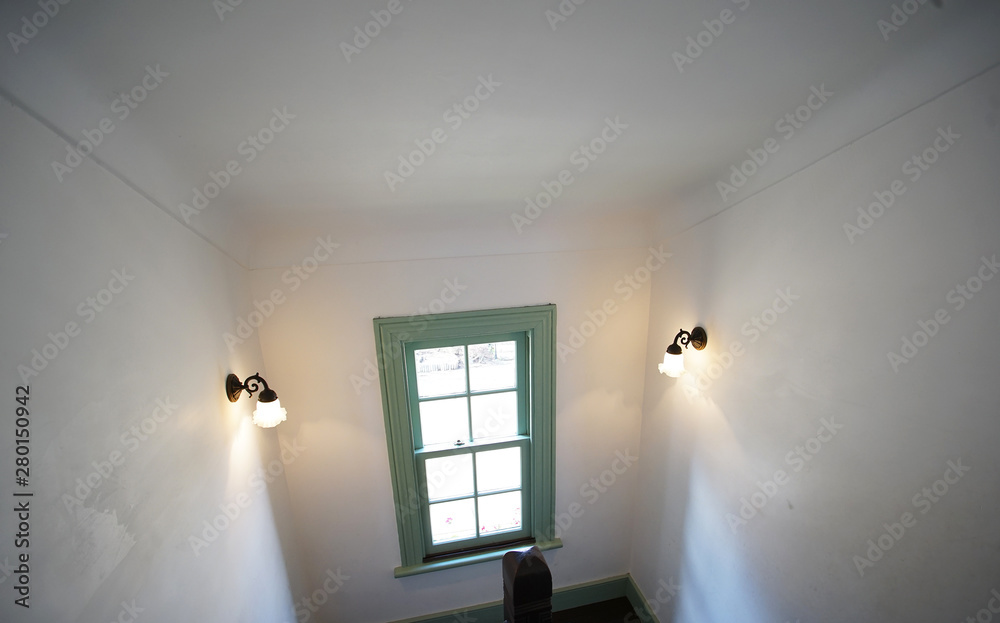 Wall mural Lighting and landing of the wall of the stairs with the window - Wall murals