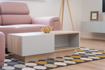 Table in contemporary living room interior