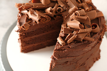 Tasty chocolate cake on plate, closeup