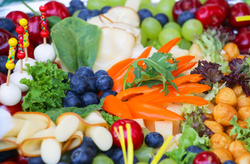 covered table of vegetable dishes for a picnic